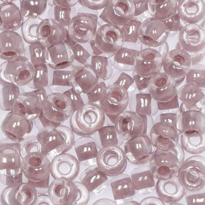 Toho Saatperlen 6/0 transparent Kristal mit lavendelfarbenem Einzug